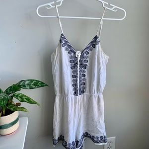 Cute, fitted romper with adjustable straps!